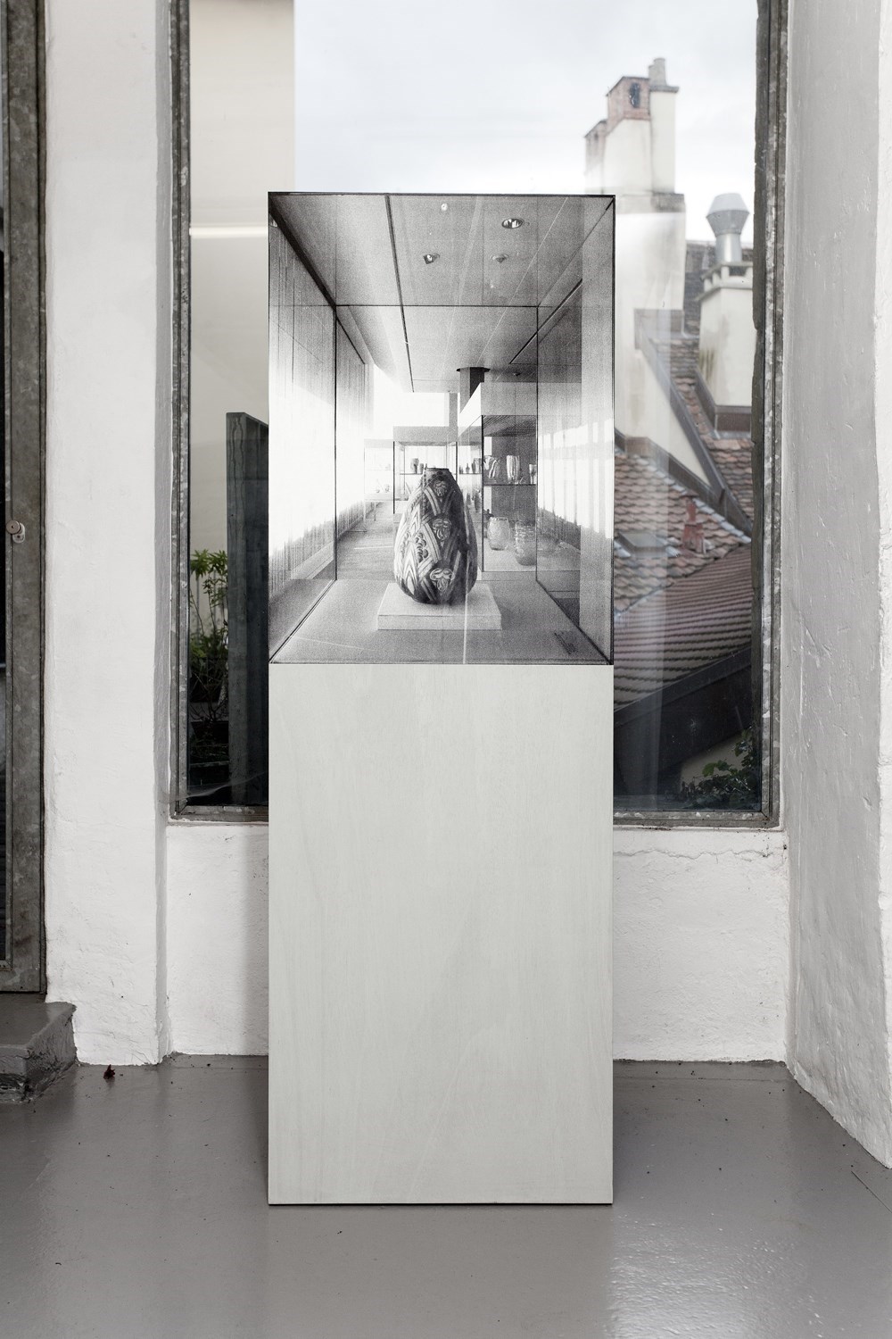 Vitrine (Vase), 180cm x 60cm x 60cm, black & white prints, wood, 2011<br />Installation view CAN Centre d'art Neuchâtel